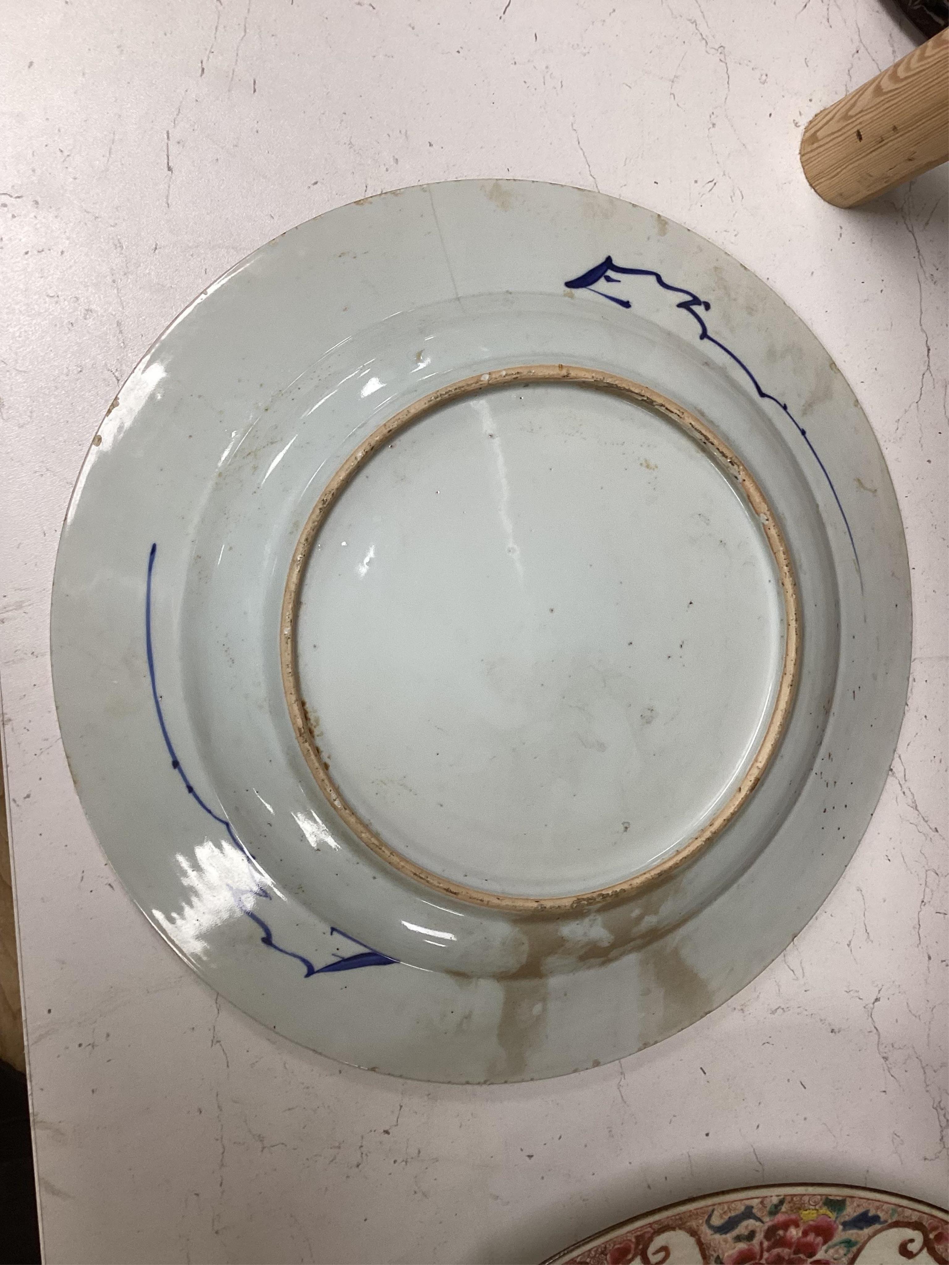 A Worcester teapot, c.1770, an 18th century Chinese famille rose and a blue and white dish, a small blue and white dish, a cup and saucer and teapot, largest dish 39cm (7). Condition - most damaged, cracked or chipped